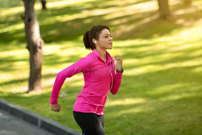 Woman jogging in the park  Women, Jogging, Girl short hair