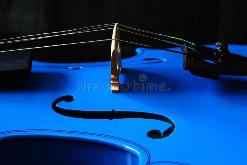 Side view of a blue violin stock photos Side view of a blue violin stock photos