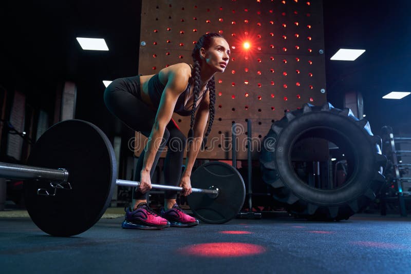 Woman Doing Deadlift Using Barbell in Gym. Stock Image - Image of ...