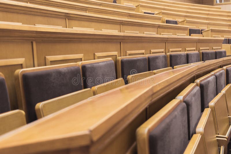 Wooden Desks With Chairs In Lecture Hall Stock Photo Image Of