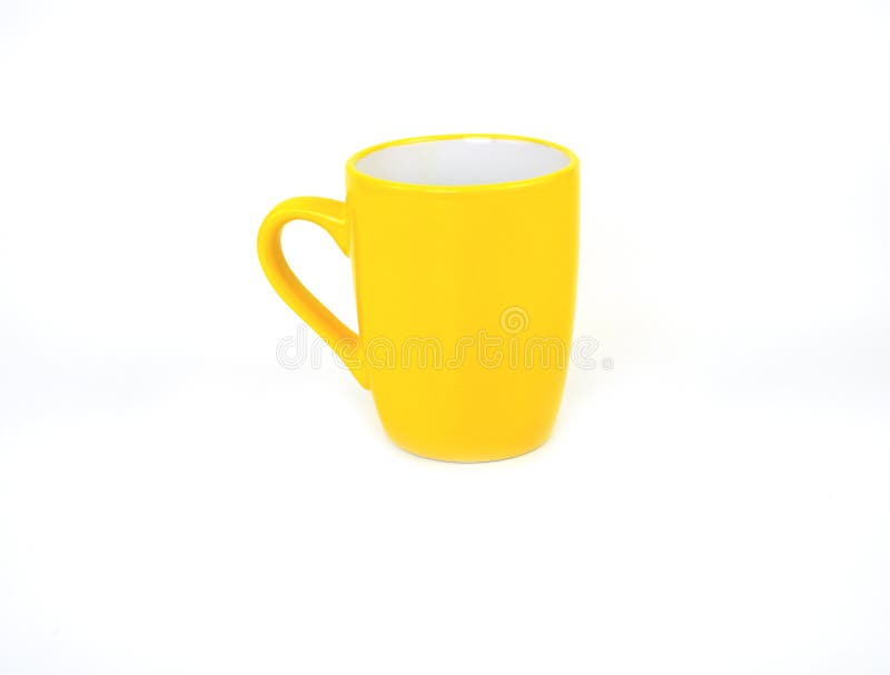 Side view, empty yellow mug isolated on white background. stock photo