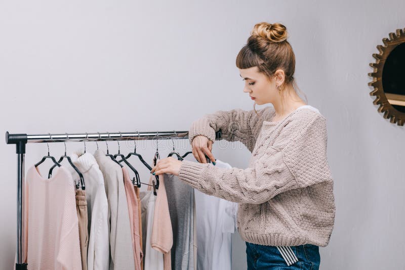 Side View of Girl Standing Near Stand and Choosing What To Stock Image ...