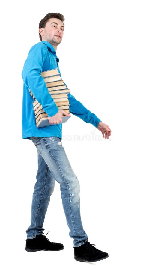 Side View of Going Man Carries a Stack of Books. Stock Image - Image of