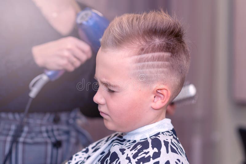 Side View Hair Dressing by the Hair Dryer. Hairdresser Does a Hair To the Caucasian Boy in Hairdressing Salon Stock Image - Image of blonde, face: 196477209 Side View Hair Dressing by the Hair Dryer. Hairdresser Does a Hair To the Caucasian Boy in Hairdressing Salon Stock Image - Image of blonde, face: 196477209