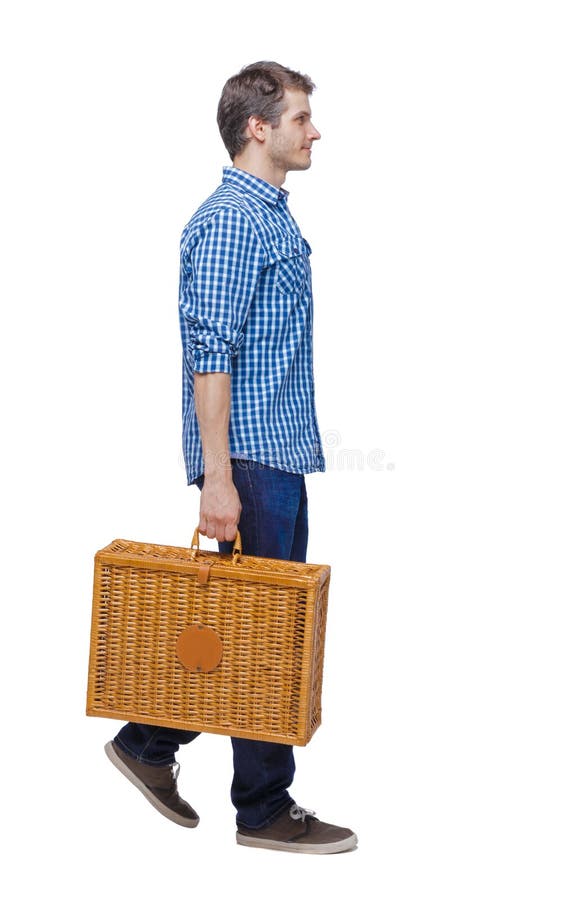 Side view of a man walking with a picnic bag stock photography Side view of a man walking with a picnic bag stock photography