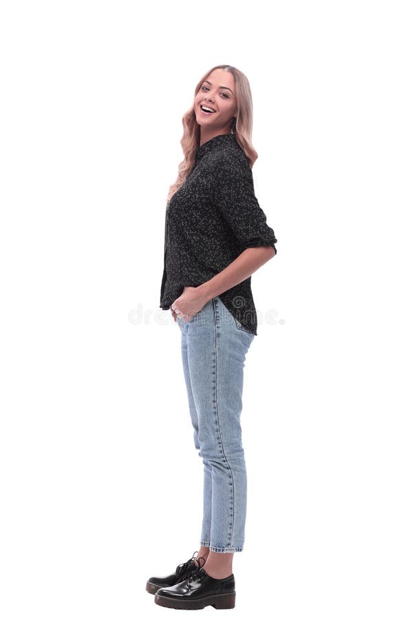 Side view. modern young woman in jeans and black blouse stock photo Side view. modern young woman in jeans and black blouse stock photo