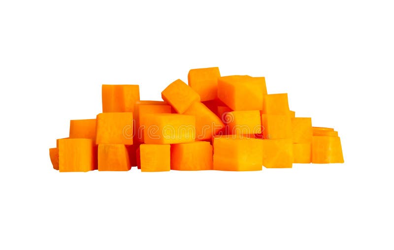 Side view of orange carrot slices or pieces in cube shape in stack isolated on white background with clipping path stock image
