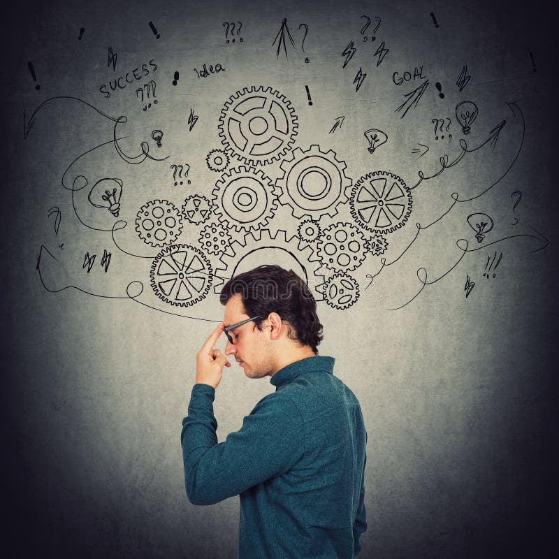 Side view portrait of pensive businessman, keeps index finger to forehead, thinking of solutions to solve the task. Pondering man stock image Side view portrait of pensive businessman, keeps index finger to forehead, thinking of solutions to solve the task. Pondering man stock image