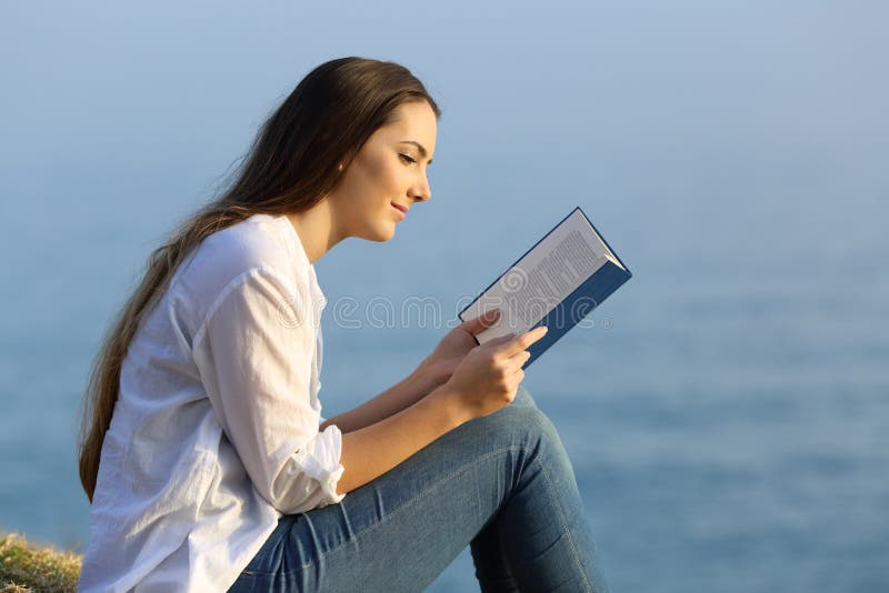 Download Relaxed Woman Reading A Book Sitting On The Beach Stock Image - Image of light, narrative: 109159629
