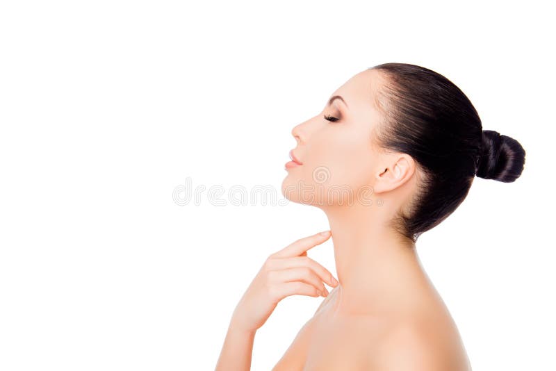 Side view of pretty woman touching her neck on white background royalty free stock image Side view of pretty woman touching her neck on white background royalty free stock image