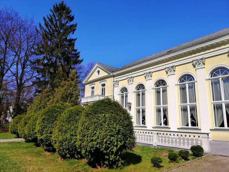 Side view shot of the hotel wall and bushes next to it in Spa Park, Jelenia GÃ³ra, Poland.