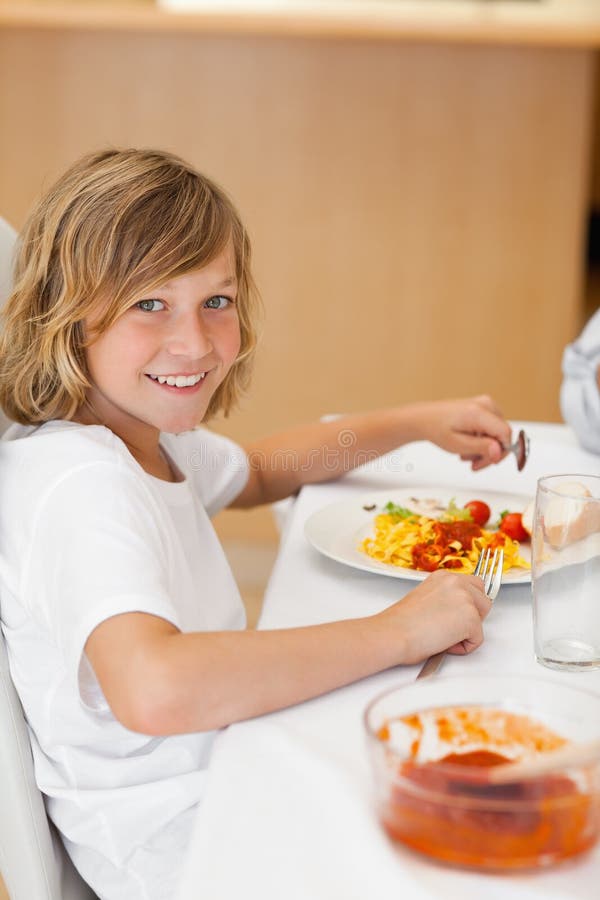 122 Side View Boy Sitting Dinner Table Stock Photos Free & Royalty