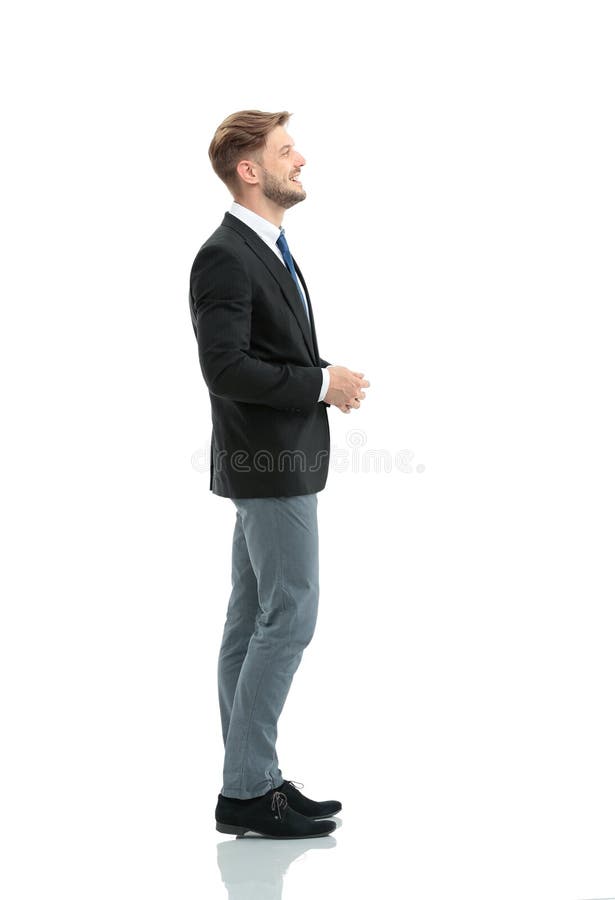 Side view of a smiling businessman standing , On white backgroun