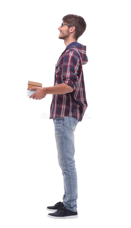 Side view. smiling male student with books. stock photos