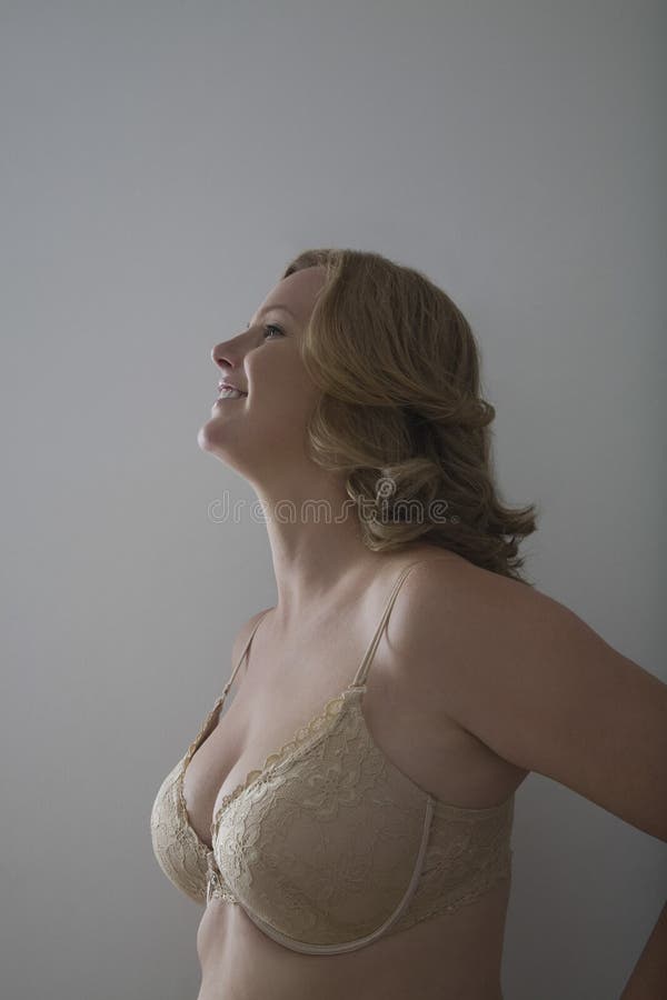 Side View of Smiling Woman in Bra Stock Image - Image of