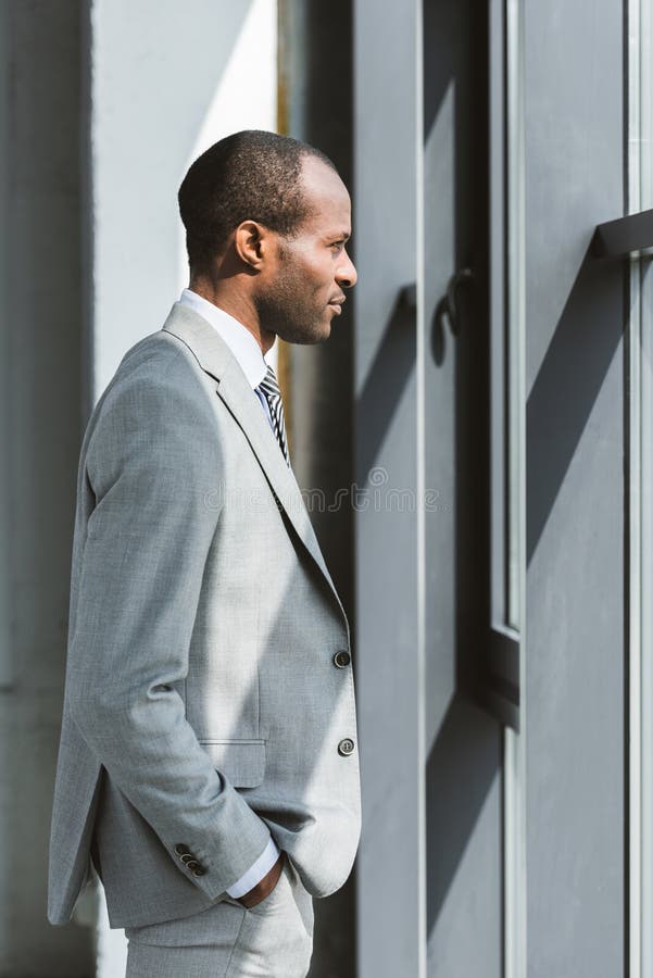 Side View of Smiling Young African American Businessman Stock Image ...