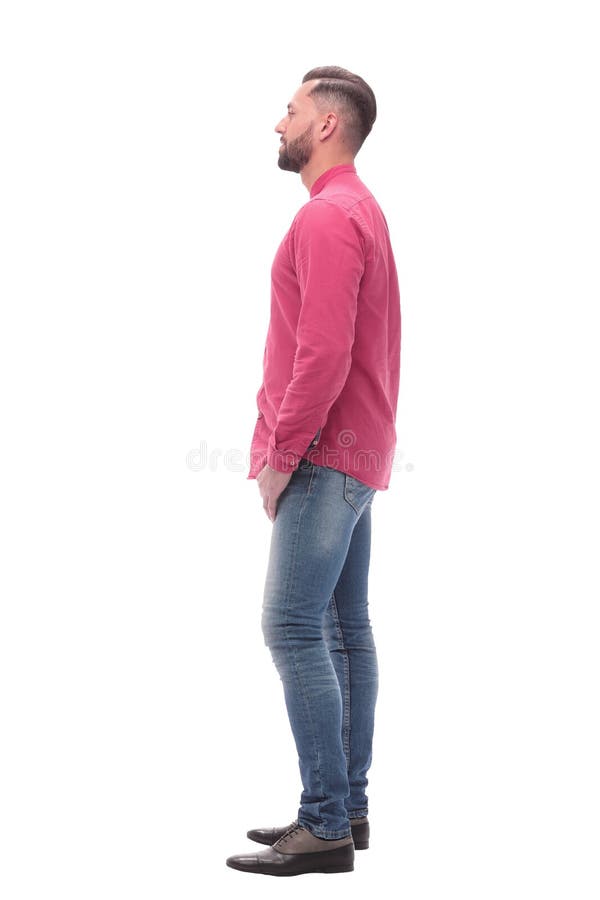 Side view. smiling young man looking forward stock photo