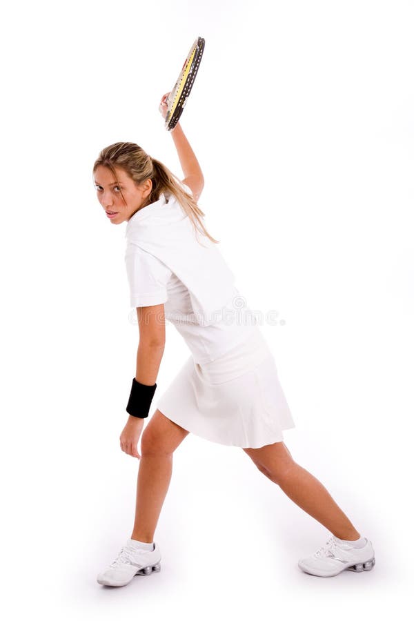 Side view of tennis player ready to hit the ball