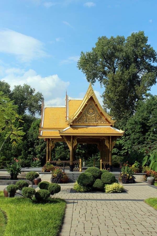A Side View of the Thai Pavilion Surrounded by Trees, Shrubs and