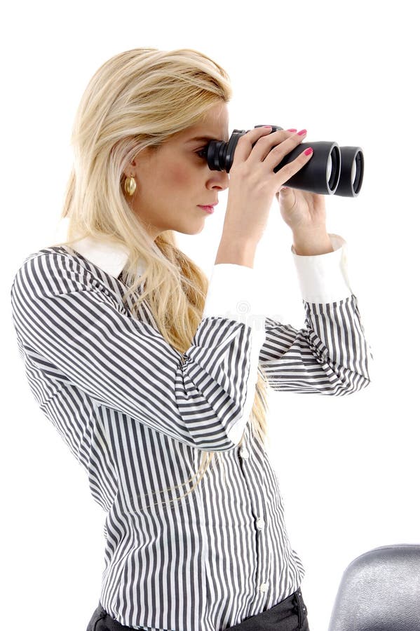 Side view of woman watching through binocular