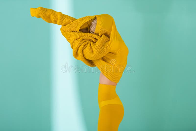 Stylish Pensive Woman in Yellow Sweater and Tights Sitting Stock Image -  Image of fashionable, fashion: 129519103