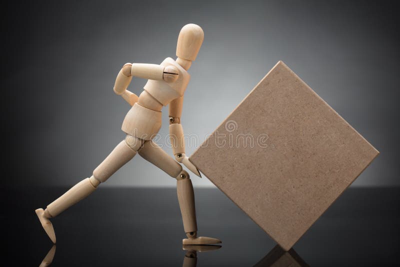 Wooden Dummy Lifting Cardboard Box Suffering From Back Pain stock images Wooden Dummy Lifting Cardboard Box Suffering From Back Pain stock images