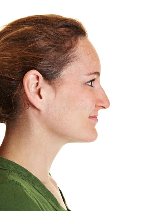 Side view of young brunette woman