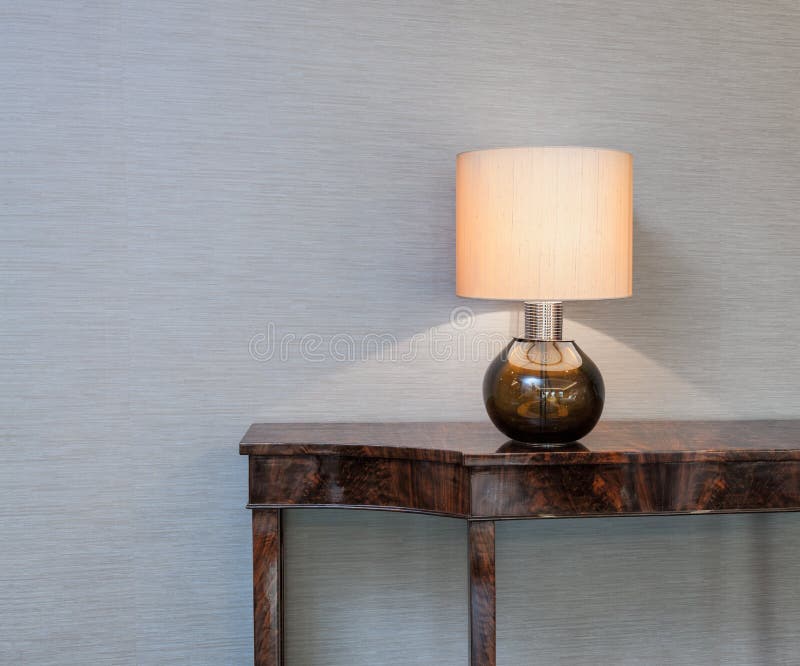 Sideboard with table lamp royalty free stock photos
