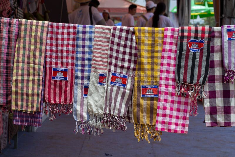 Siem Reap, Cambodia - 14 April 2018: Traditional cambodian scarves on souvenir market. Tourist souvenir shop stock image Siem Reap, Cambodia - 14 April 2018: Traditional cambodian scarves on souvenir market. Tourist souvenir shop stock image
