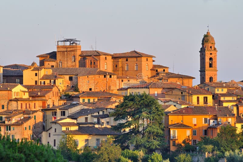 A The view of Siena - touristic attraction Siena - Tuscany â€“Italy. View of the ancient Town. Photo taken on: june 16th, 2009. A The view of Siena - touristic attraction Siena - Tuscany â€“Italy. View of the ancient Town. Photo taken on: june 16th, 2009.