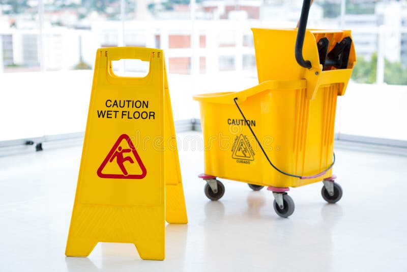 Mopping bucket with hairy mop, a bucket with a mop and a mop holder Stock  Photos