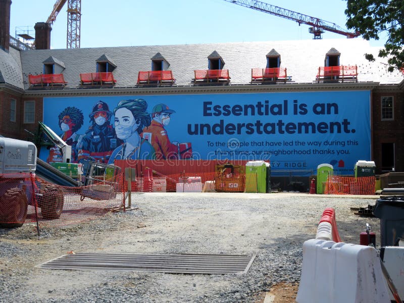 Photo of sign celebrating essential workers in washington dc on 6/24/20 at the city ridge development.  This development is mixed use retail and residential.