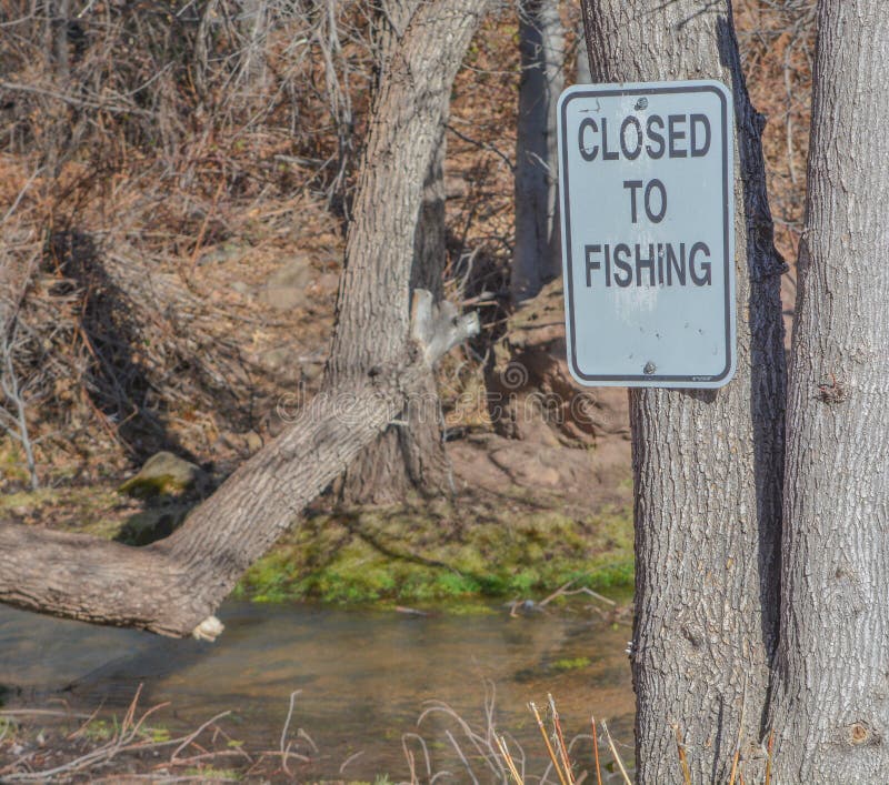 Sign - Closed to Fishing. Arizona game and fish department at Tonto Creek Hatchery. Payson, Gila County, Arizona USA.