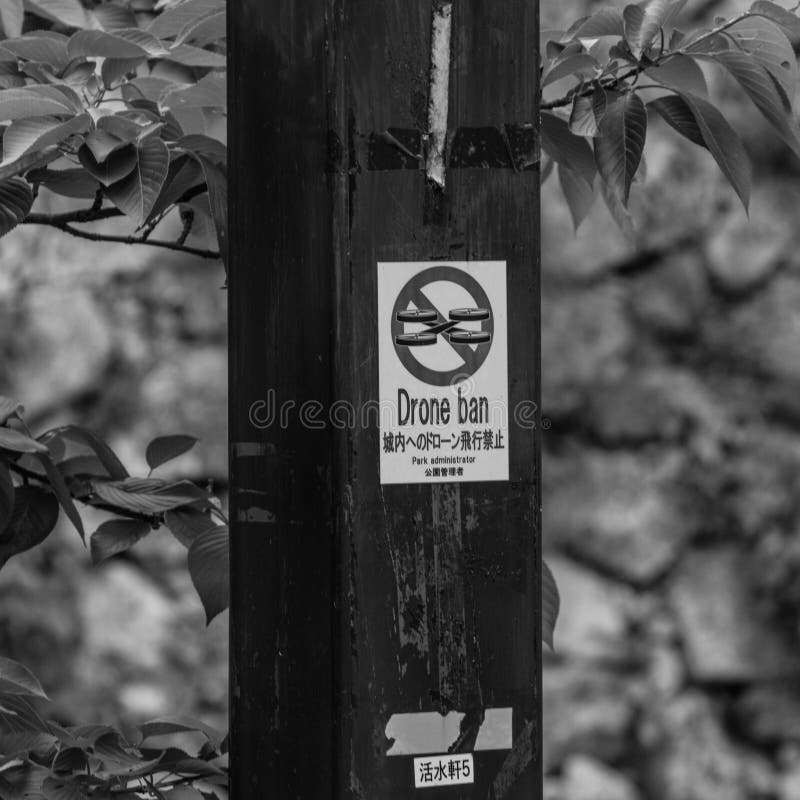 Sign with `Drone Ban` lettering, written in english and japanese words. royalty free stock photo Sign with `Drone Ban` lettering, written in english and japanese words. royalty free stock photo