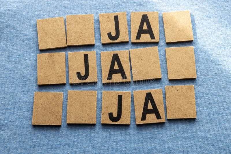 Sign formed with small pieces of wood with the text ja ja ja stock