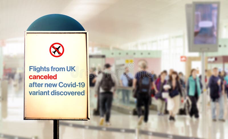 A sign inside an airport warns of the cancellation of flights form UK after new Covid-19 variant discover