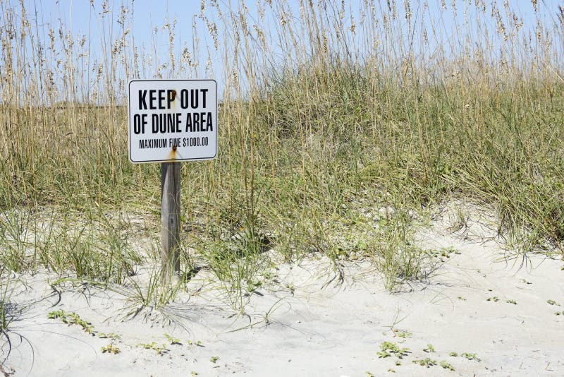 Keep off the Dunes Too stock image. Image of fence, blue - 1229373