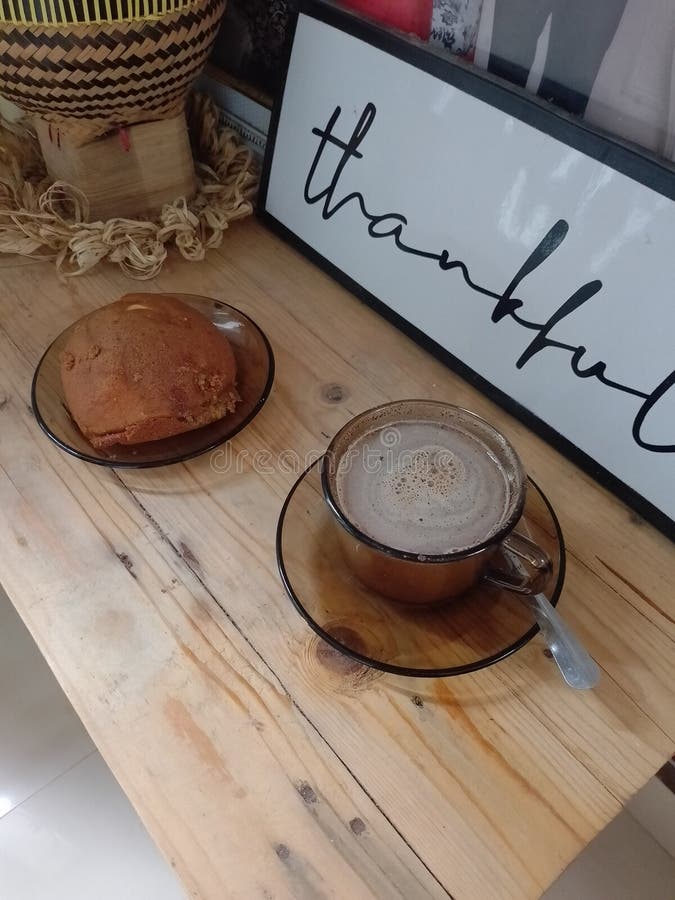 Sign of love in the morning, a cup of coffee and a slice of bread stock photos