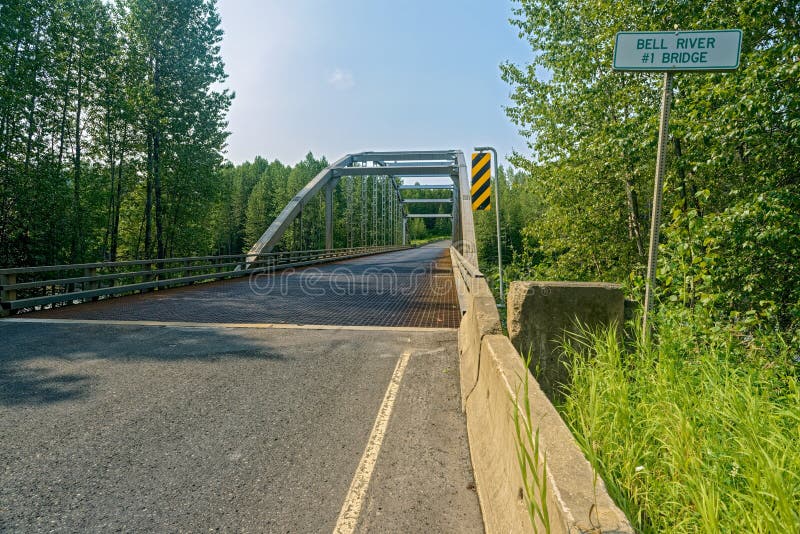 A sign marks the Bell River Bridge 1 in British Columbia, Canada