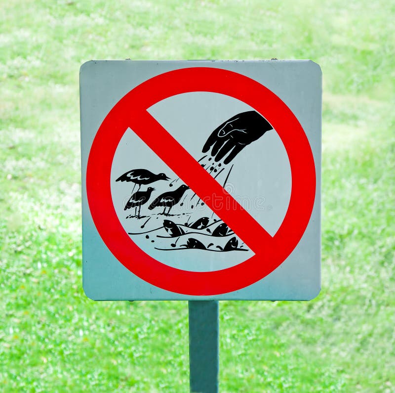 The sign of no feeding bird and fish