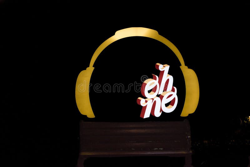 Sign Oh NO headphones, blue black background night royalty free stock image Sign Oh NO headphones, blue black background night royalty free stock image
