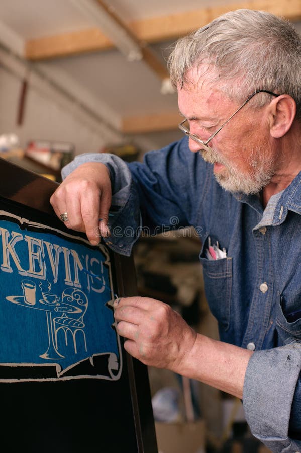 Sign Painter Working stock image. Image of adult, commercial 2140213