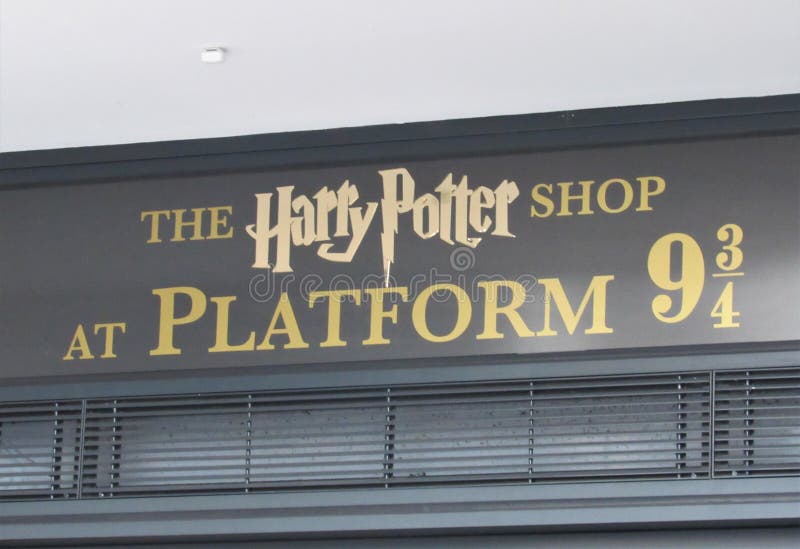 Sign for platform 9 3/4 in King`s Cross Train Station in London. Sign for platform 9 3/4 in King`s Cross Train Station in London