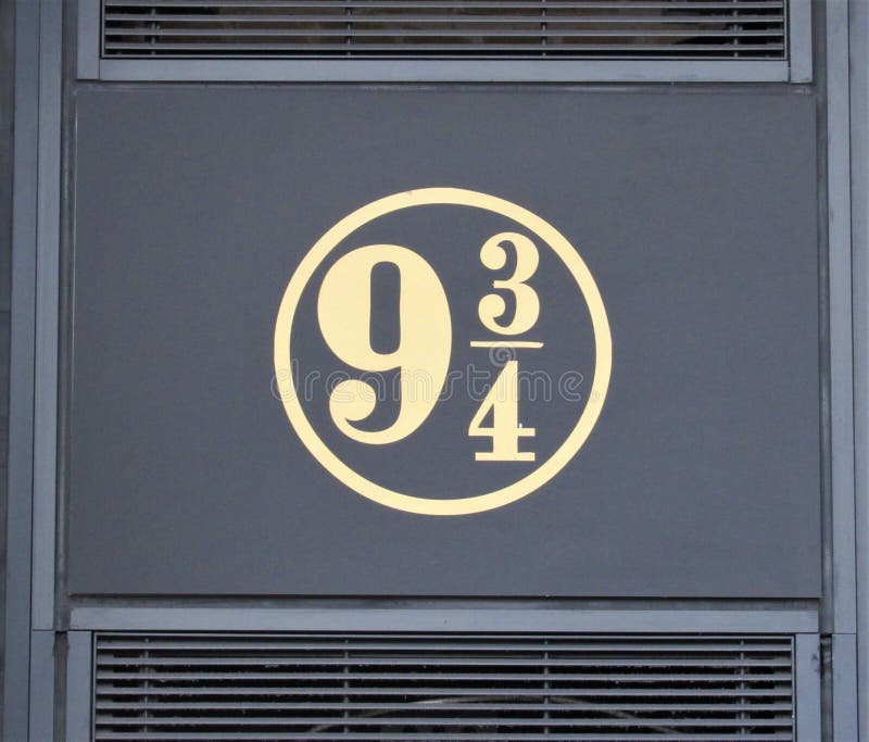Sign for platform 9 3/4 in King`s Cross Train Station in London. Sign for platform 9 3/4 in King`s Cross Train Station in London