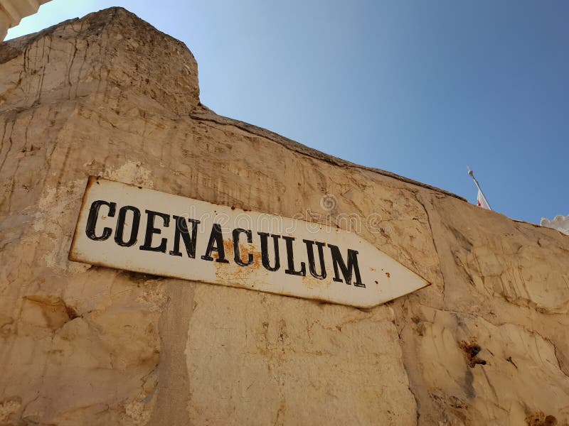 Sign pointing to the abbey of Dormition Church of the Cenacle on mount Zion, Israel.