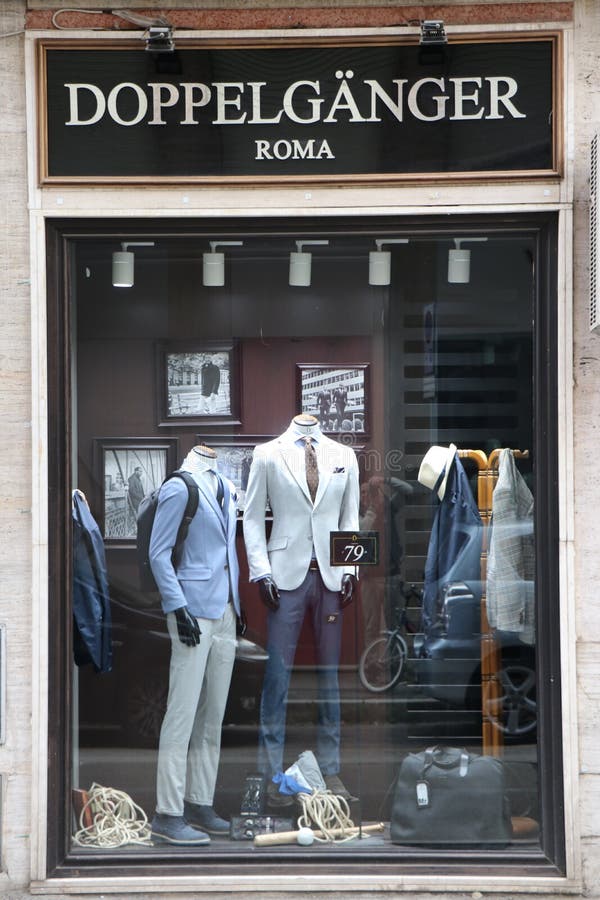 Sign and showcase of a DOPPEL GÄNGER clothing store stock images Sign and showcase of a DOPPEL GÄNGER clothing store stock images