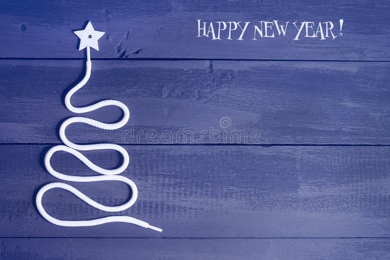 Sign symbol Christmas tree on a wooden background. A copy of space. The idea of a merry new year. Christmas. stock photos Sign symbol Christmas tree on a wooden background. A copy of space. The idea of a merry new year. Christmas. stock photos
