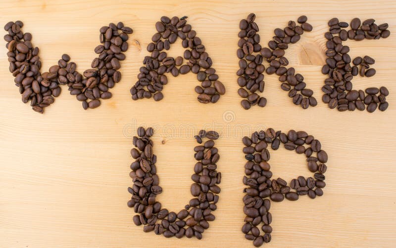 Sign Wake Up Made of Coffee Beans on Wooden Table Stock Photo Image