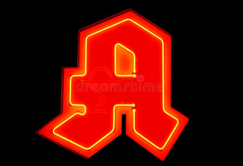 Signe allemand de pharmacie/néon rouge photos stock Signe allemand de pharmacie/néon rouge photos stock