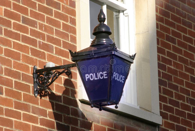 Signe bleu de lampe de police photos stock Signe bleu de lampe de police photos stock